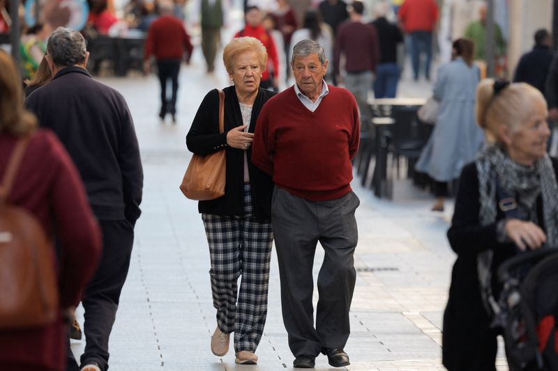 &copy; Reuters. Pensioners walk along a street in Ronda, Spain, March 30, 2023. REUTERS/Jon Nazca