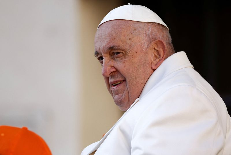 &copy; Reuters. Pope Francis arrives for the weekly general audience in St. Peter's Square at the Vatican, March 29, 2023. REUTERS/Guglielmo Mangiapane