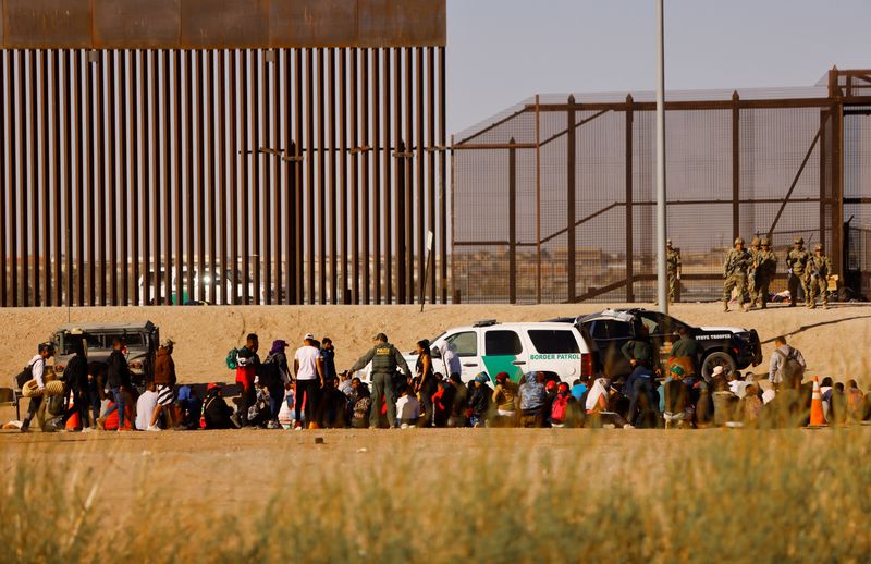 Over 1,000 migrants, angered by asylum policies, rush to U.S.-Mexico border