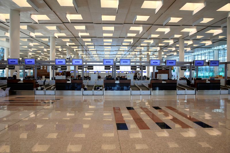 &copy; Reuters. FILE PHOTO: A general view of the check-in area during a media tour of the newly built Islamabad International Airport Terminal, ahead of its official opening, Pakistan April 18, 2018. REUTERS/Faisal Mahmood