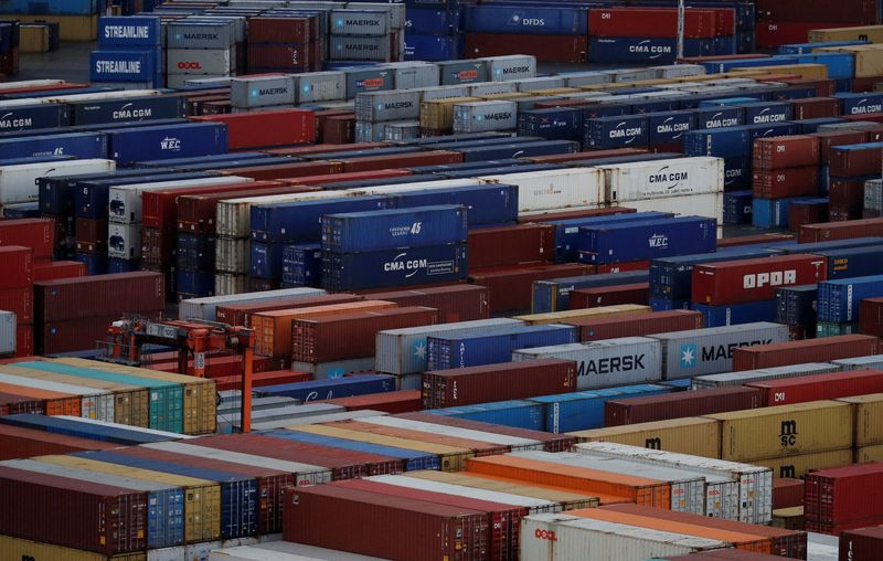 &copy; Reuters. FILE PHOTO: Shipping containers are seen stacked at Peel Ports container terminal in Liverpool northern England, December 9, 2016. REUTERS/Phil Noble