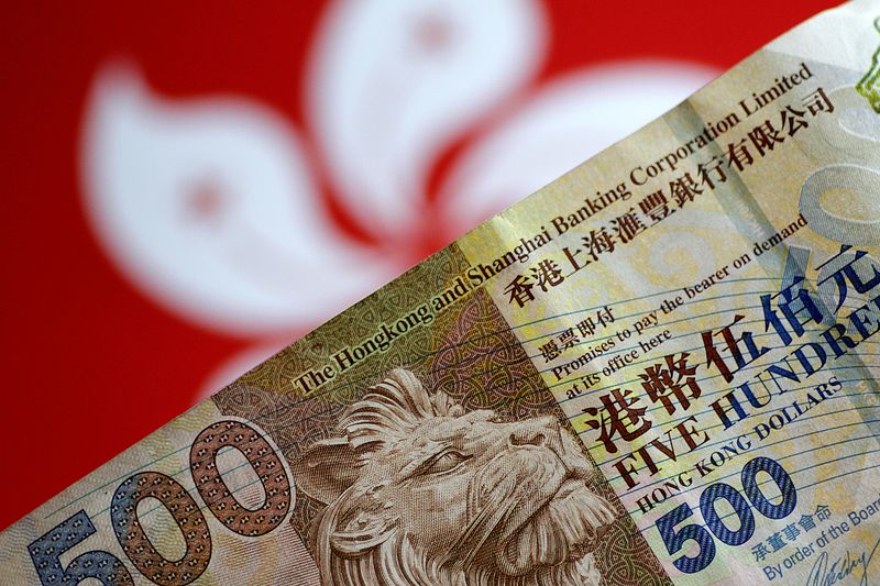 &copy; Reuters. FILE PHOTO: A Hong Kong dollar note is seen in this illustration photo May 31, 2017.     REUTERS/Thomas White/Illustration