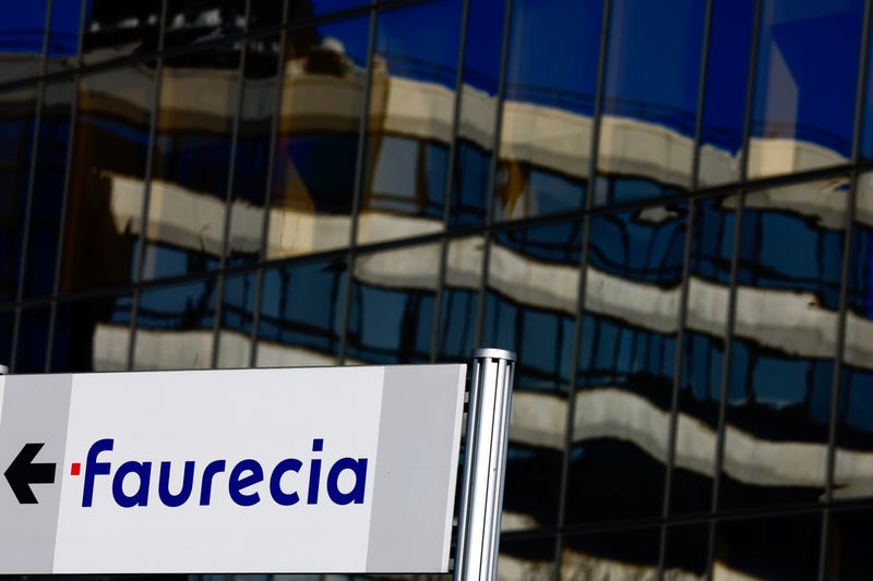 &copy; Reuters. FILE PHOTO: A logo of French car parts supplier Faurecia is seen near the company's headquarters in Nanterre near Paris, France, February 7, 2022. REUTERS/Gonzalo Fuentes