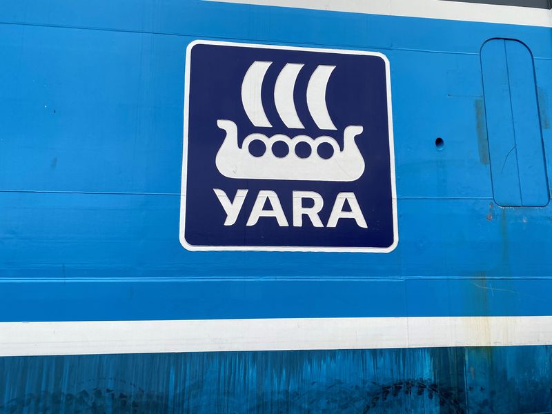 &copy; Reuters. FILE PHOTO: The Yara International company logo is seen on Yara Birkeland, the world's first fully electric and autonomous container vessel, in Oslo, Norway November 19, 2021. REUTERS/Victora Klesty