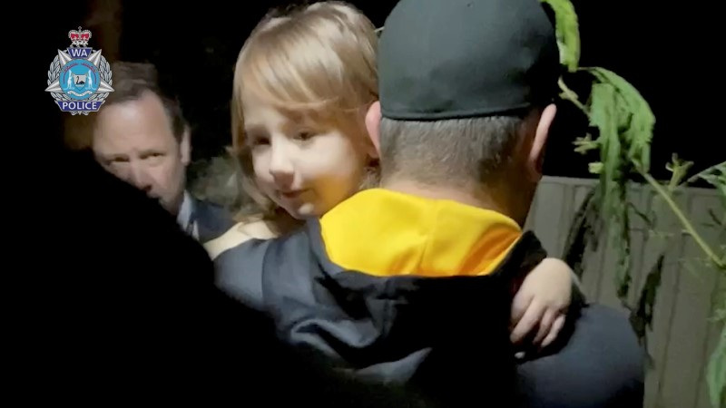 &copy; Reuters. Bodycam footage shows a security officer carrying 4-year-old Cleo Smith, who went missing from an Australian outback campsite more than two weeks ago and was found in a locked house on November 3, as she is being rescued, in Carnarvon, Australia, November