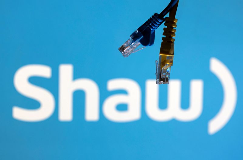 &copy; Reuters. FILE PHOTO: Ethernet cables are seen in front of Shaw Communications logo in this illustration taken, July 8, 2022. REUTERS/Dado Ruvic/Illustrations