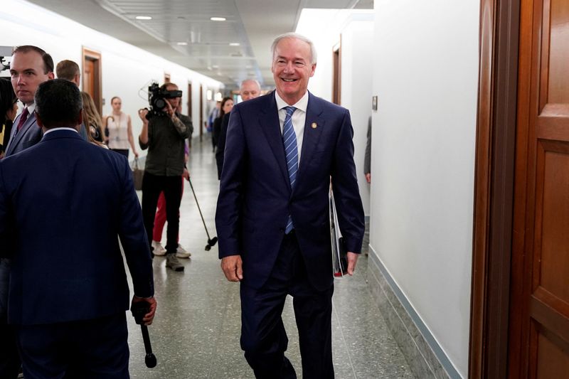 &copy; Reuters. FILE PHOTO: Arkansas Governor Asa Hutchinson walks through the Dirksen Senate office building on Capitol Hill in Washington, U.S., June 22, 2021. REUTERS/Joshua Roberts/File Photo