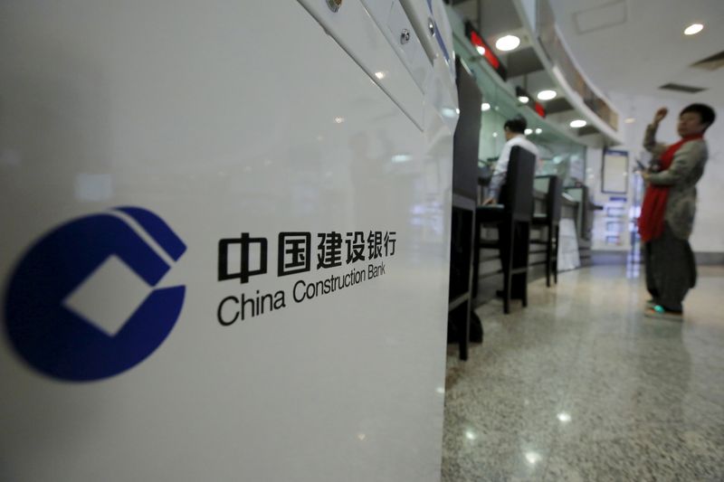 &copy; Reuters. FILE PHOTO: A customer waits at a counter of a branch of China Construction Bank Corp (CCB) at its headquarters in Beijing, China, March 31, 2016. REUTERS/Kim Kyung-Hoon/File Photo