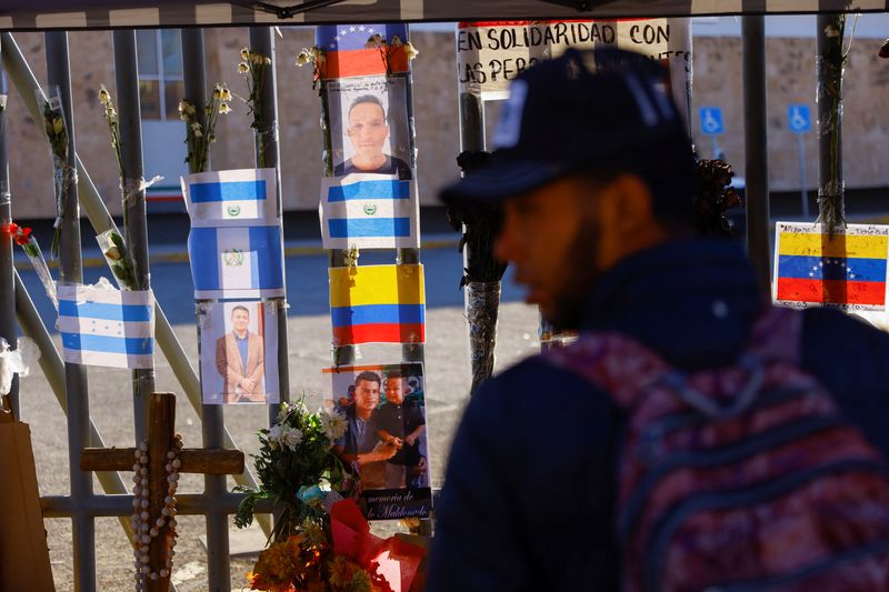 &copy; Reuters. FILE PHOTO: A migrant stands near a makeshift memorial outside the immigration detention center where several migrants died after a fire broke out late on Monday, in Ciudad Juarez, Mexico March 31, 2023. REUTERS/Jose Luis Gonzalez