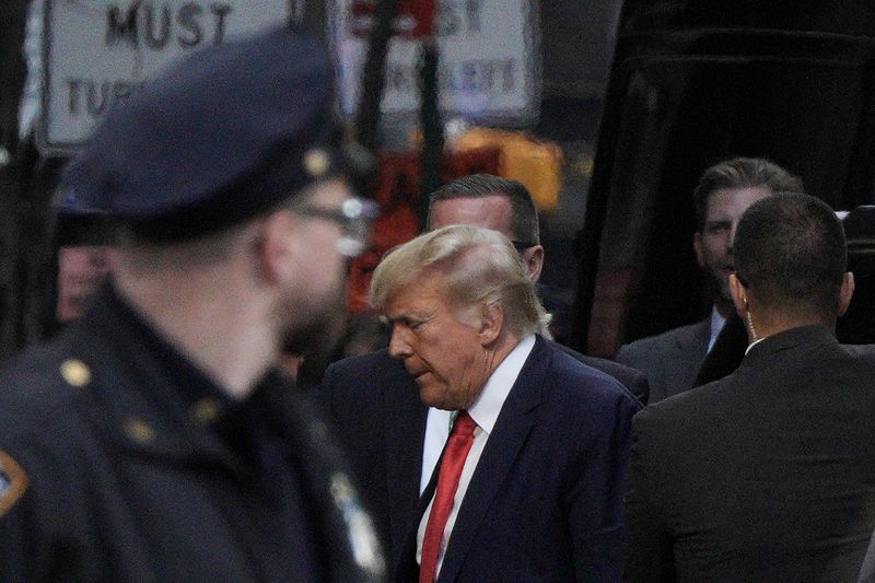 &copy; Reuters. Former U.S. President Donald Trump and his son Eric Trump arrive at Trump Tower, after former President Trump's indictment by a Manhattan grand jury following a probe into hush money paid to porn star Stormy Daniels, in New York City, U.S April 3, 2023.  