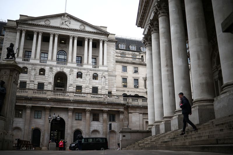 &copy; Reuters. FILE PHOTO: A person walks outside the Bank of England in the City of London financial district, in London, Britain, January 26, 2023. REUTERS/Henry Nicholls