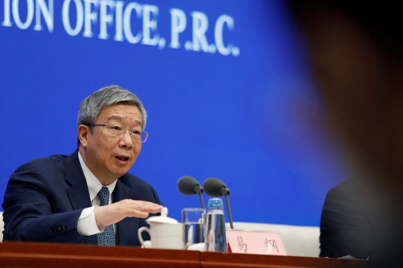 &copy; Reuters. People's Bank of China (PBOC) Governor Yi Gang attends a news conference in Beijing, China March 3, 2023. REUTERS/Florence Lo