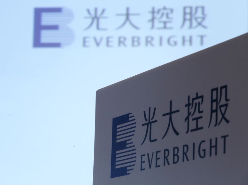 &copy; Reuters. FILE PHOTO: The company logos of China Everbright Limited are displayed at a news conference on the company's annual results in Hong Kong, China March 23, 2016.  REUTERS/Bobby Yip