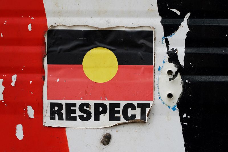 &copy; Reuters. FILE PHOTO: A sticker of the Australian Aboriginal Flag along with the word "RESPECT" is pictured on a structure at the Aboriginal Tent Embassy, a site of protest since 1972, in Canberra, Australia, May 4, 2022. Picture taken May 4, 2022.  REUTERS/Loren E