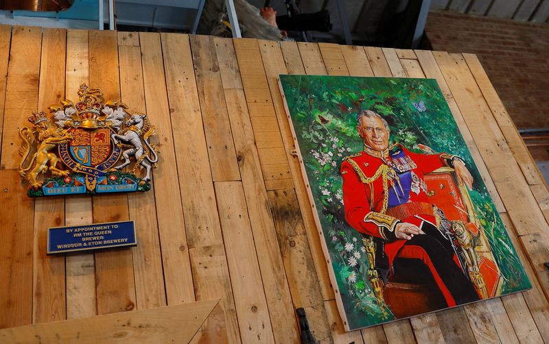 &copy; Reuters. FILE PHOTO: A print of the picture of Britain's King Charles, used on the bottles of a coronation ale called Return Of The King, is seen at the bar area of the Windsor and Eton Brewery, in Windsor Britain, April 5, 2023. REUTERS/Peter Nicholls/File Photo