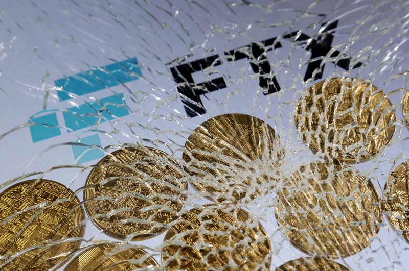 &copy; Reuters. FILE PHOTO: An FTX logo and a representation of cryptocurrencies are seen through broken glass in this illustration taken December 13, 2022. REUTERS/Dado Ruvic/Illustration/File Photo