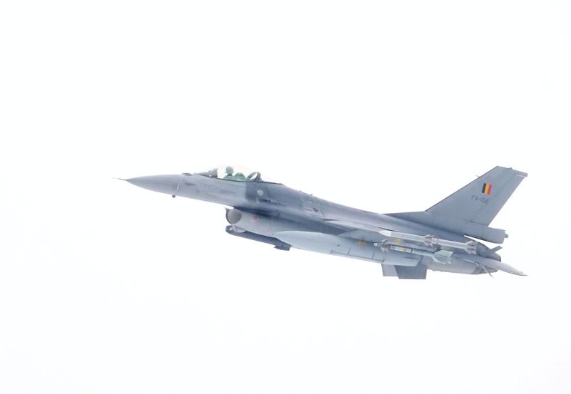 &copy; Reuters. FILE PHOTO: Belgium Air Force F-16 fighter flies over the Amari military airfield, Estonia February 1, 2022. REUTERS/Ints Kalnins/File Photo