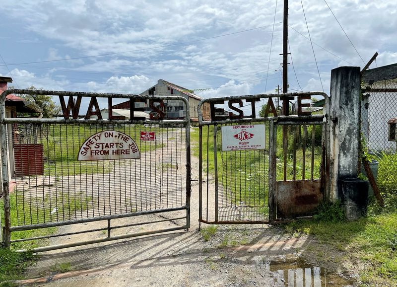 &copy; Reuters. FILE PHOTO: View of the gates of the abandoned Wales Sugar Estate, in Wales, Guyana, May 21, 2022. REUTERS/Gram Slattery/File Photo