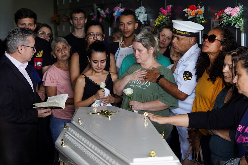 Young victim of Brazil daycare center attack is buried