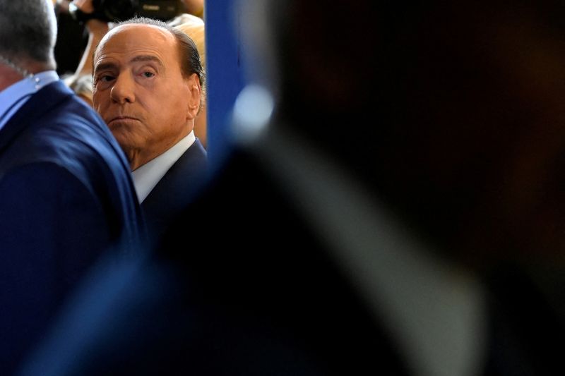 &copy; Reuters. FILE PHOTO: Forza Italia party leader Silvio Berlusconi looks on at a polling station during the snap election, in Milan, Italy, September 25, 2022. REUTERS/Flavio Lo Scalzo/File Photo