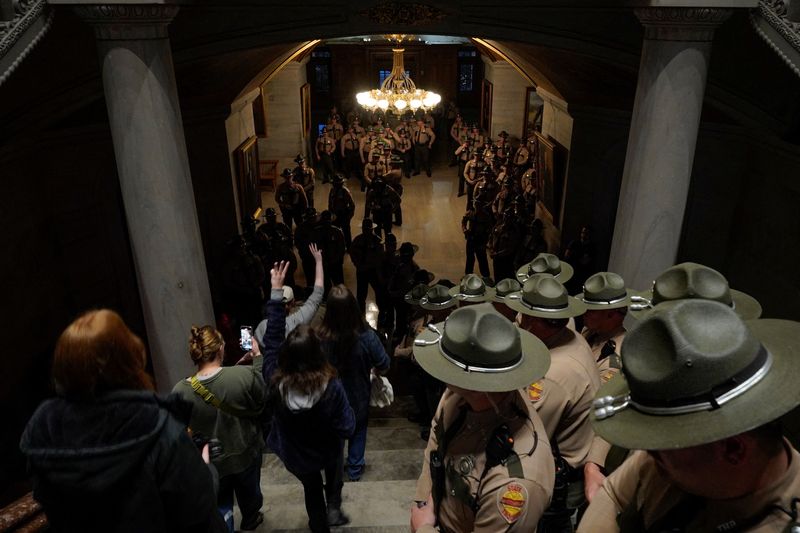 &copy; Reuters. People exit the building after a vote on to expel two of three Democratic members for their role in a gun control demonstration at the statehouse last week, in Nashville, Tennessee, U.S., April 6, 2023. REUTERS/Cheney Orr