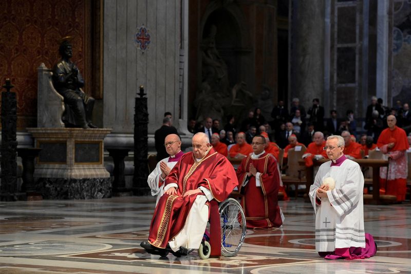 &copy; Reuters. Pope Francis presides over the Good Friday Passion of the Lord service in Saint Peter's Basilica at the Vatican, April 7, 2023.    Vatican Media/­Handout via REUTERS 