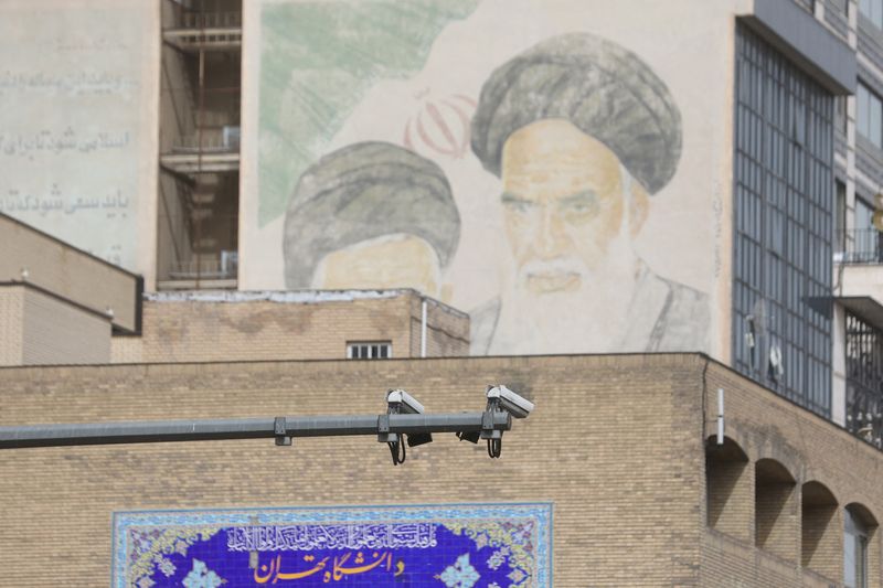 Iran installs cameras in public sites to identify unveiled women -police statement