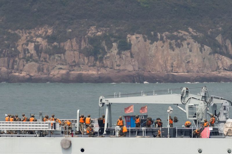 &copy; Reuters. FILE PHOTO: Soldiers stand on the deck of a Chinese warship as it sails during a military drill near Fuzhou, Fujian Province, near the Taiwan-controlled Matsu Islands that are close to the Chinese coast, China, April 8, 2023.  REUTERS/Thomas Peter
