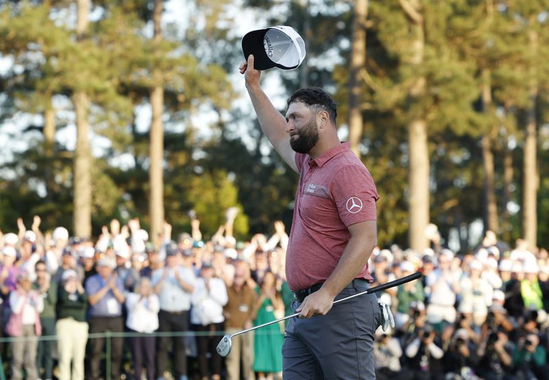 &copy; Reuters. Golf - The Masters - Augusta National Golf Club - Augusta, Georgia, U.S. - April 9, 2023 Spain's Jon Rahm celebrates on the 18th green after winning The Masters REUTERS/Jonathan Ernst