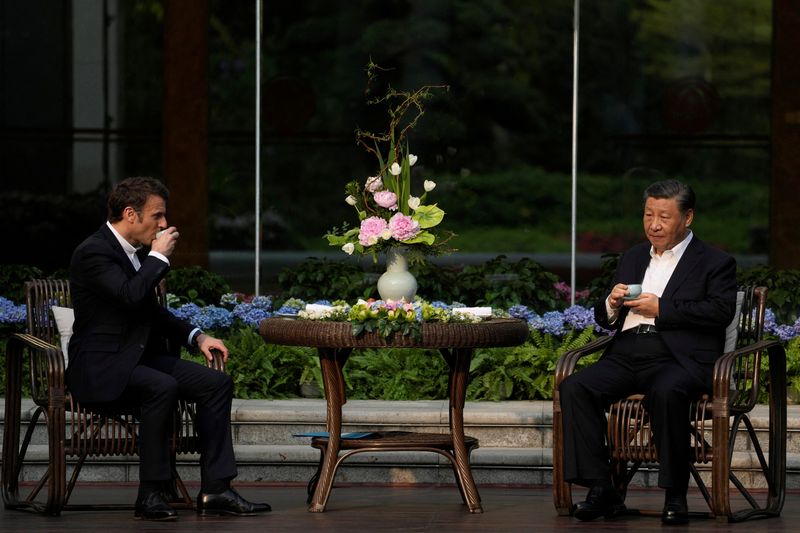 &copy; Reuters. 　４月７日、中国の習近平国家主席は、国賓として中国に招いたフランスのマクロン大統領を異例なほどの好待遇でもてなした。広東省広州で代表撮影（２０２３年　ロイター）