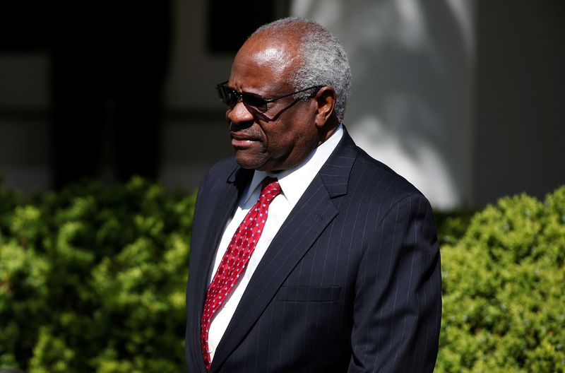 &copy; Reuters. Associate Supreme Court Justice Clarence Thomas arrives for the swearing in ceremony of Judge Neil Gorsuch as an Associate Supreme Court Justice in the Rose Garden of the White House in Washington, U.S., April 10, 2017.    REUTERS/Joshua Roberts