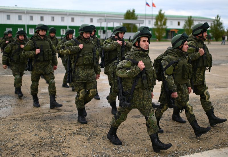 &copy; Reuters. FILE PHOTO:  Russian reservists recruited during the partial mobilisation of troops attend a ceremony before departing to the zone of Russia-Ukraine conflict, in the Rostov region, Russia October 31, 2022. REUTERS/Sergey Pivovarov