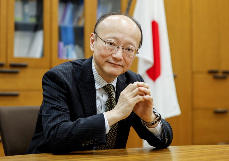 &copy; Reuters. FILE PHOTO: Japan's vice minister of finance for international affairs, Masato Kanda, poses for a photograph during an interview with Reuters at the Finance Ministry in Tokyo, Japan January 31, 2022. Picture taken January 31, 2022. REUTERS/Issei Kato