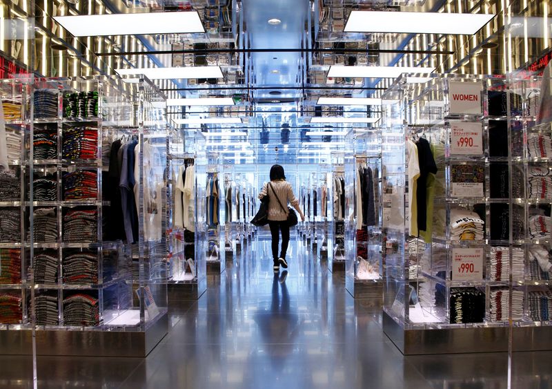 &copy; Reuters. FILE PHOTO: A woman looks at clothes at a Fast Retailing's Uniqlo store in Tokyo, Japan, January 24, 2017. Picture taken on January 24, 2017.   REUTERS/Kim Kyung-Hoon