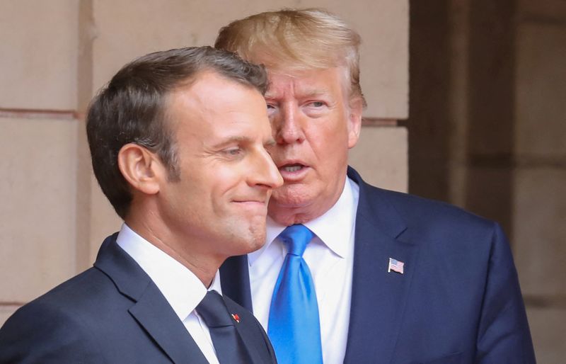 &copy; Reuters. FILE PHOTO: French President Emmanuel Macron speaks with U.S. President Donald Trump ahead of a meeting at the Prefecture of Caen, on the sidelines of D-Day commemorations marking the 75th anniversary of the World War II Allied landings in Normandy, Franc