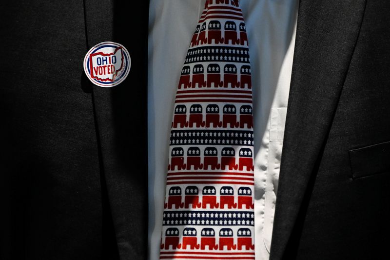 &copy; Reuters. FILE PHOTO:  An attendee wears a tie with the Republican Party's symbol while waiting for results at the primary election watch party for Republican U.S. Senate candidate J.D. Vance in Cincinnati, Ohio, U.S. May 3, 2022. REUTERS/Gaelen Morse