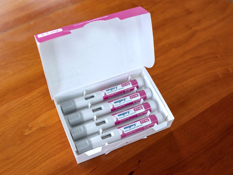 &copy; Reuters. FILE PHOTO: A selection of injector pens for the Wegovy weight loss drug are shown in this photo illustration in Chicago, Illinois, U.S., March 31, 2023.  REUTERS/Jim Vondruska/Illustration