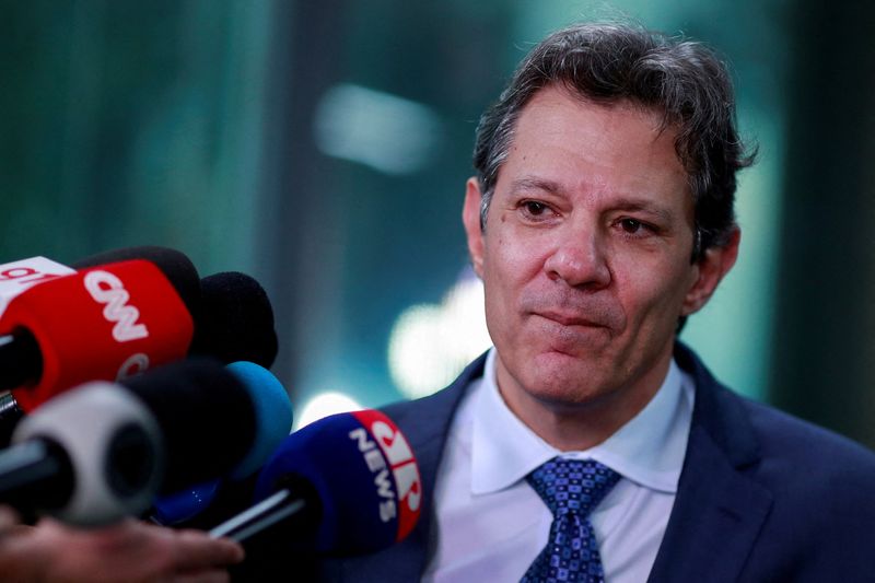 &copy; Reuters. FILE PHOTO: Brazil's Finance Minister Fernando Haddad reacts while speaking with journalists after a meeting with Brazil's Central Bank President Roberto Campos Neto in Brasilia, Brazil, April 3, 2023. REUTERS/Ueslei Marcelino/File Photo