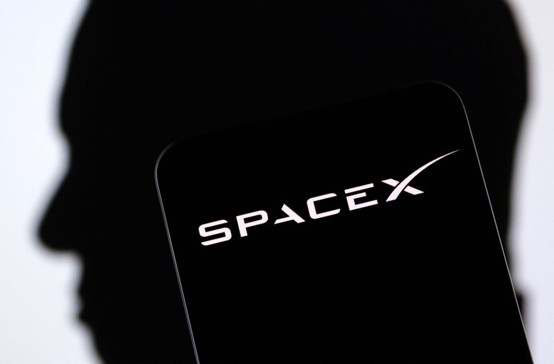 &copy; Reuters. SpaceX logo and Elon Musk silhouette are seen in this illustration taken, December 19, 2022. REUTERS/Dado Ruvic/Illustration