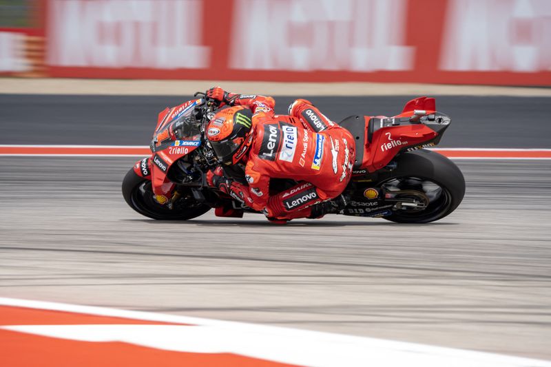 &copy; Reuters. Apr 14, 2023; Austin, TX, USA; Francesco Bagnaia (1) of Italy and Ducati Lenovo Team rounds turn 11 during the MotoGP second free practice at Circuit of the Americas. Mandatory Credit: Dustin Safranek-USA TODAY Sports