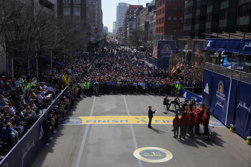 &copy; Reuters. Members of the public fill Boylston Street to watch a dedication ceremony at the finish line on the ten year anniversary of the 2013 Boston Marathon bombings in Boston, Massachusetts, U.S., April 15, 2023.     REUTERS/Brian Snyder