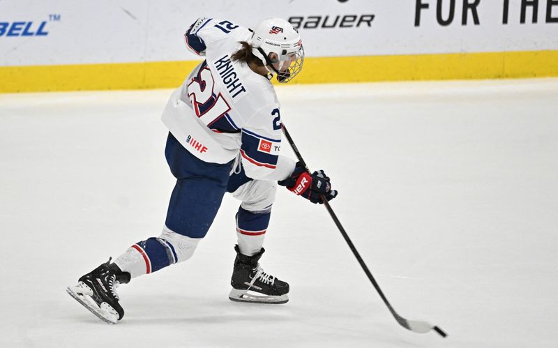 &copy; Reuters. FILE PHOTO: Apr 15, 2023; Brampton, Ontario, CAN;    USA forward Hilary Knight (21) shoots the puck against Czechia in the third period at CAA Center. Mandatory Credit: Dan Hamilton-USA TODAY Sports