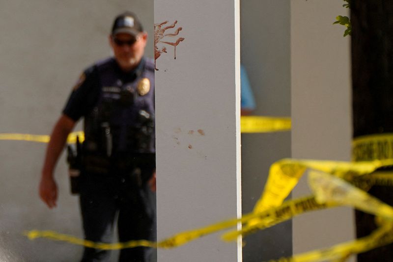 © Reuters. A bloody handprint marks a pillar the day after a shooting during a teenager's birthday party at MahoganyMasterpiece Dance Studio in Dadeville, Alabama, U.S. April 16, 2023.  REUTERS/Cheney Orr