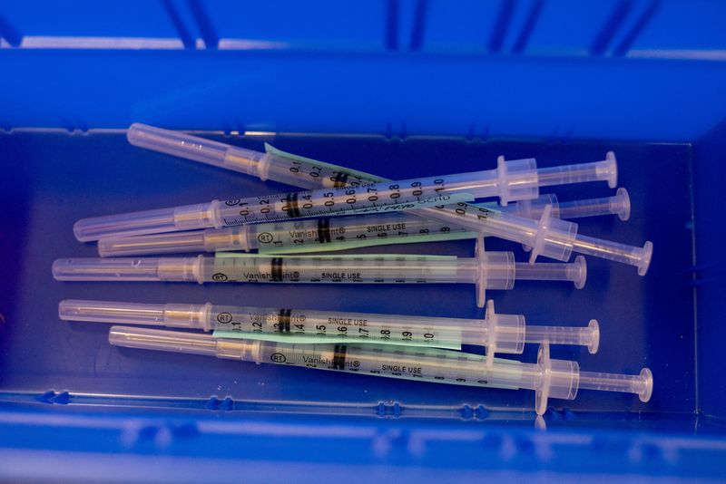 &copy; Reuters. FILE PHOTO: Syringes ready to be administrated to residents who are over 50 years old and immunocompromised and are eligible to receive their second booster shots of the coronavirus disease (COVID-19) vaccines are seen in Waterford, Michigan, U.S., April 