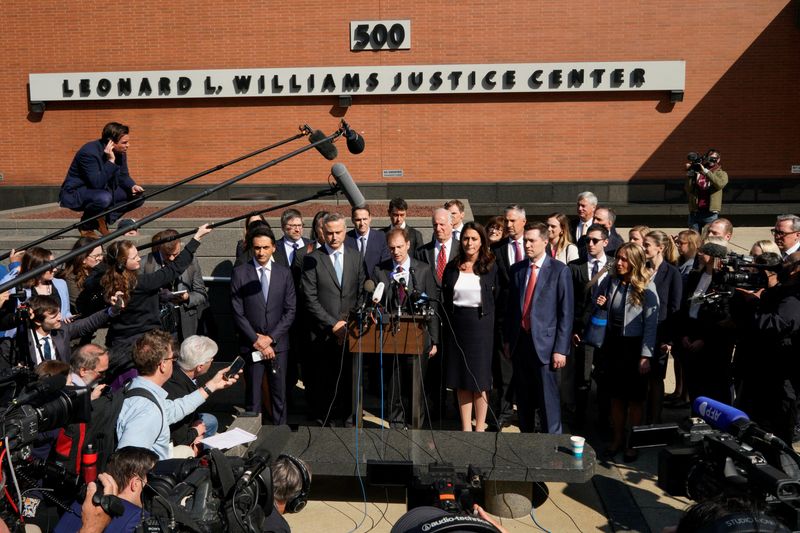 © Reuters. Dominion CEO John Poulos and lawyers speak to the media after Dominion Voting Systems and Fox settled a defamation lawsuit for $787.5 million, avoiding trial, over Fox's coverage of debunked election-rigging claims, in Delaware Superior Court, in Wilmington, Delaware, U.S. April 18, 2023. REUTERS/Eduardo Munoz
