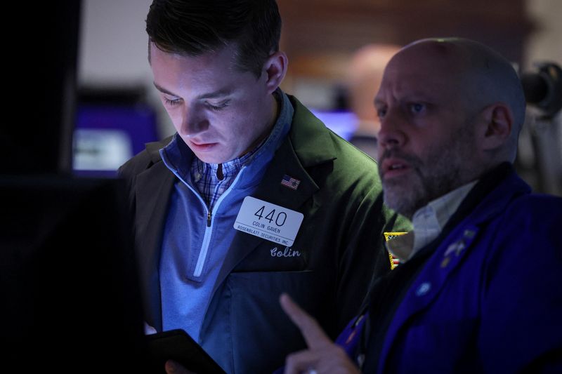 &copy; Reuters. FILE PHOTO: Traders work on the floor of the New York Stock Exchange (NYSE) in New York City, U.S., April 10, 2023.  REUTERS/Brendan McDermid