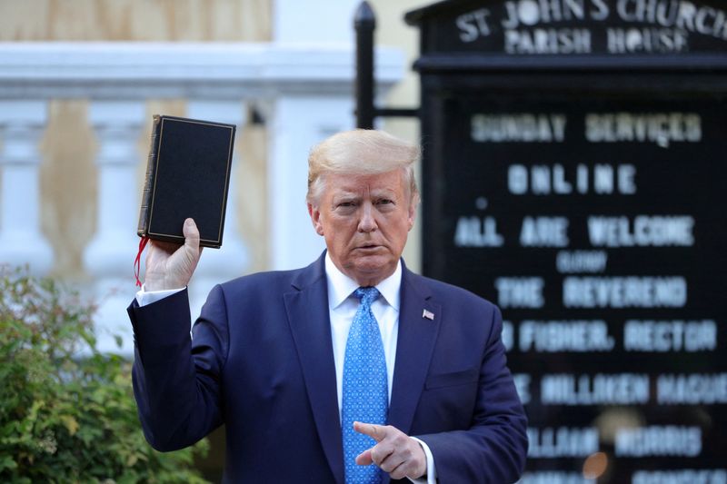 &copy; Reuters. FILE PHOTO: U.S. President Donald Trump holds up a Bible during a photo opportunity in front of St. John's Episcopal Church in the midst of ongoing protests over racial inequality in the wake of the death of George Floyd while in Minneapolis police custod