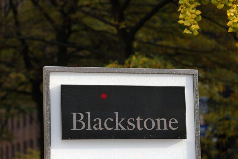 &copy; Reuters. FILE PHOTO: Signage is seen outside The Blackstone Group headquarters in Manhattan, New York, U.S., November 12, 2021. REUTERS/Andrew Kelly