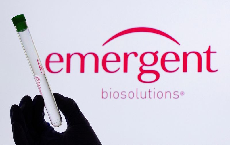 &copy; Reuters. FILE PHOTO: A woman holds a test tube in front of displayed Emergent logo in this illustration taken, May 21, 2021. REUTERS/Dado Ruvic/Illustration/File Photo