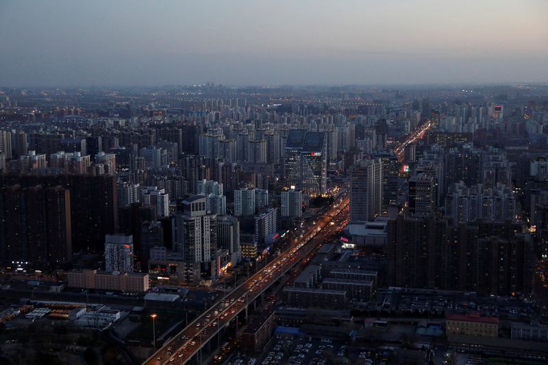 &copy; Reuters. FILE PHOTO: A general view shows traffic during evening rush hour at the central business district (CBD) in Beijing, China, January 15, 2021. Picture taken January 15, 2021. REUTERS/Tingshu Wang